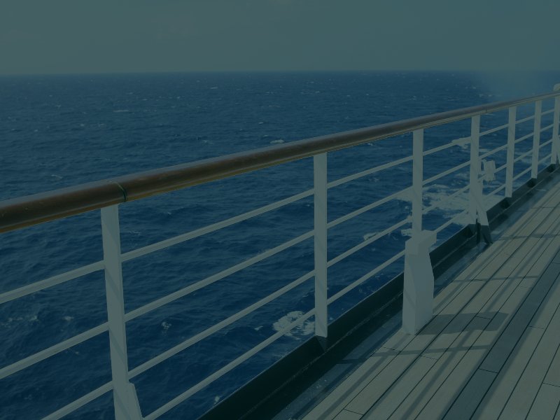 Railing on the side of a boat on the ocean
